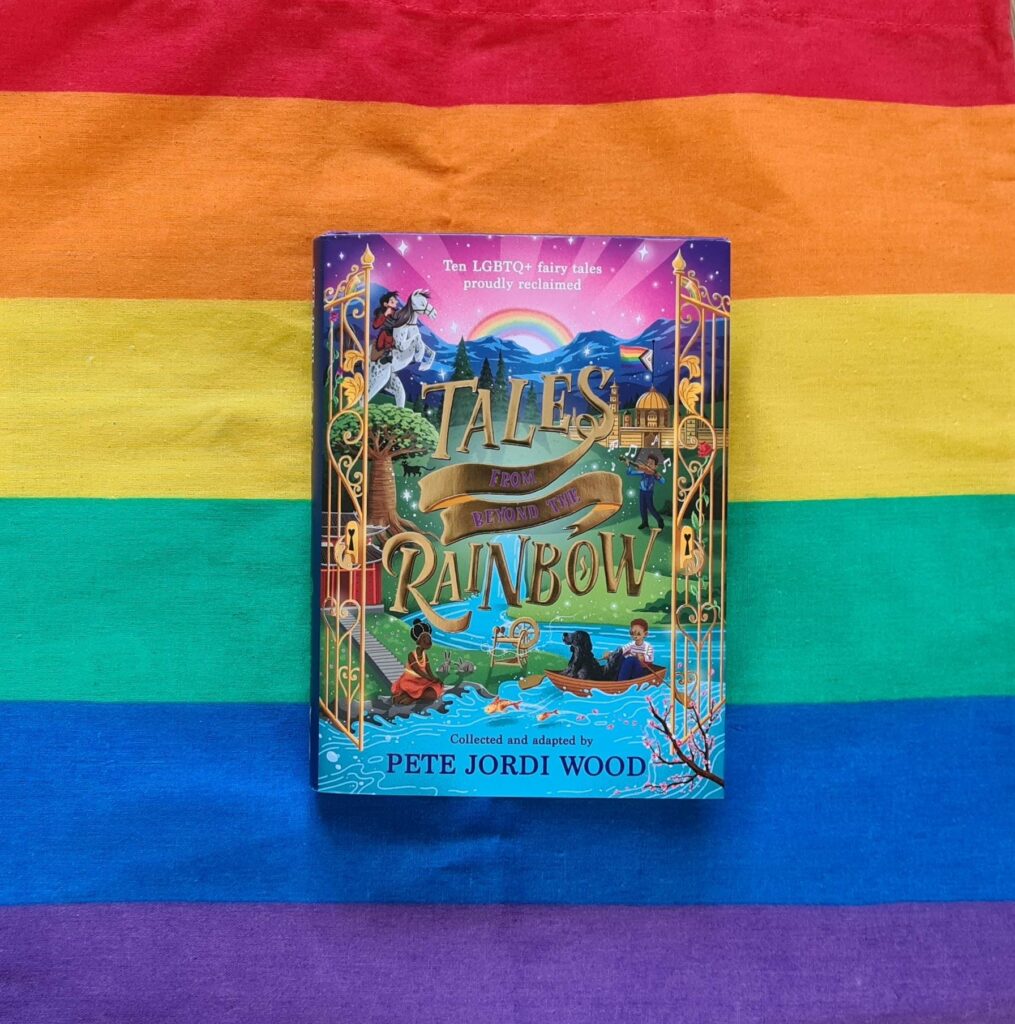 Het boek Tales from beyond the rainbow op een regenboog achtergrond | Het magische verhaal
